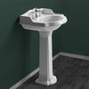 23" Traditional Pedestal with an Integrated small oval bowl, Backsplash, Dual Soap Ledges, and Decorative Trim