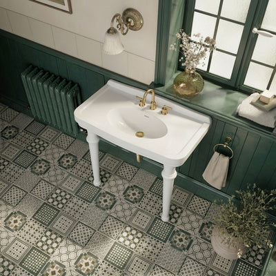 Console sink with integrated oval bowl, low-rise backsplash, ceramic leg support & overflow
