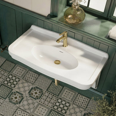 Wall mount sink with integrated oval bowl, low-rise backsplash, decorative trim & overflow