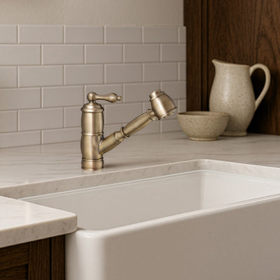 Solid brass deck mount single-hole kitchen faucet with a pull-out spray head and lever handle