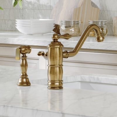 Single lever faucet with traditional swivel spout and solid brass side spray