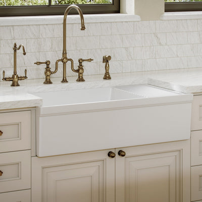 Large reversible single bowl fireclay kitchen sink: integral drain board, 2½” lip front apron