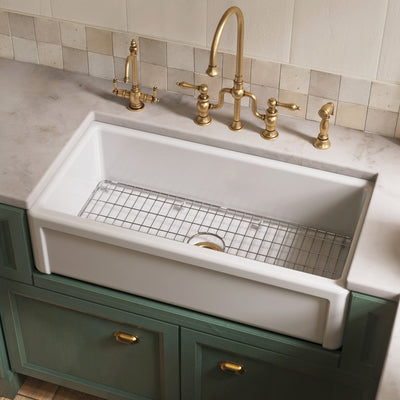 Reversible fireclay kitchen sinks with grid: three edge frame, plain front apron