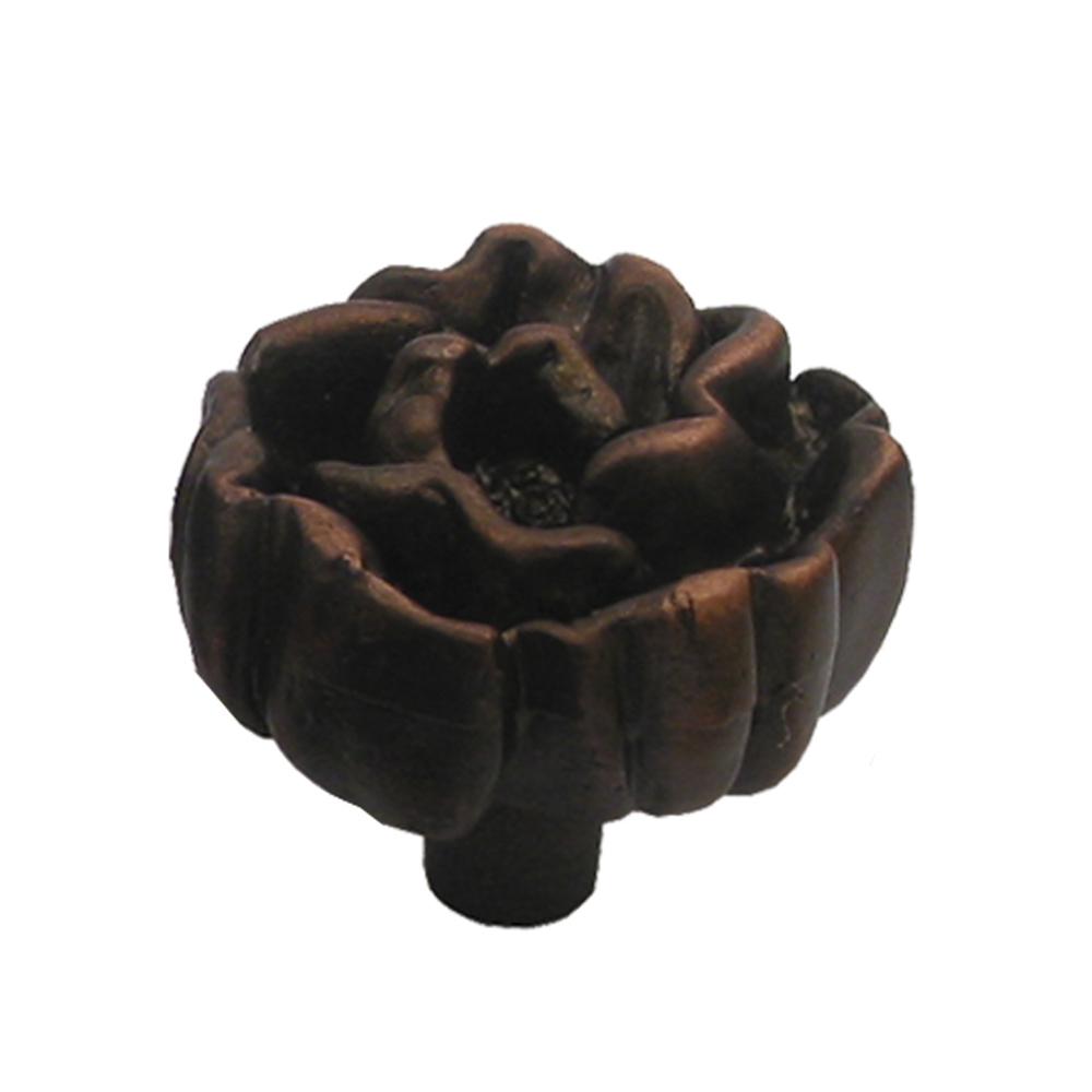 Solid brass rosette-shaped knob.