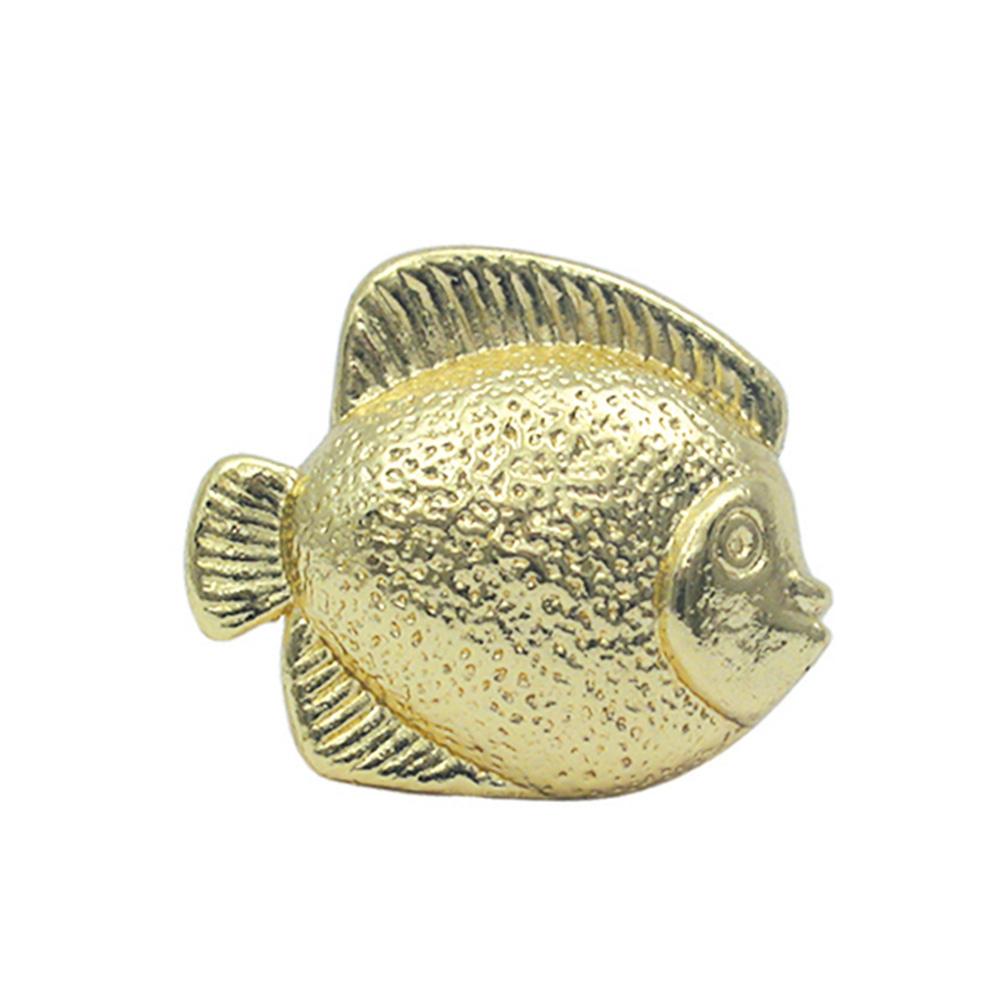 Solid brass fish-shaped knob.