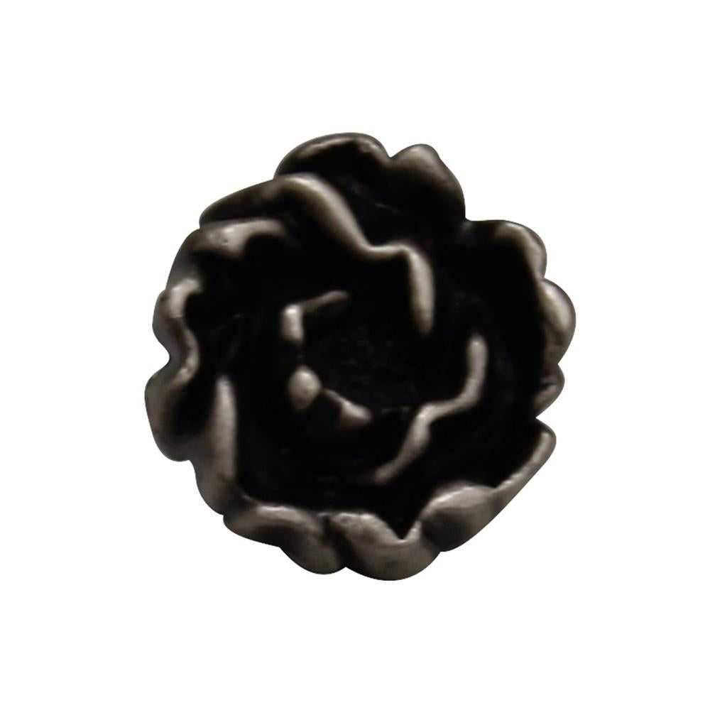 Solid brass rosette-shaped knob.